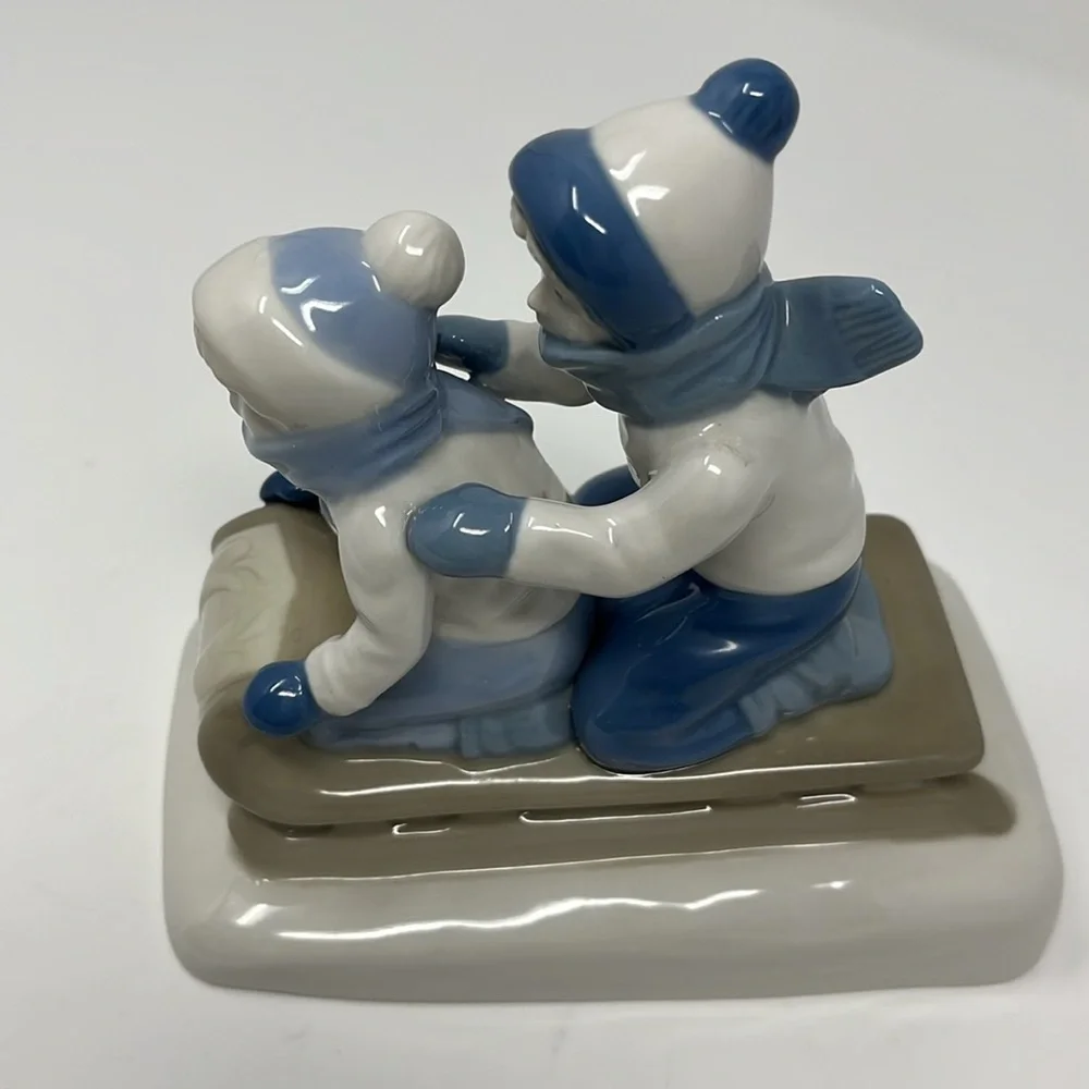 Porcelana De Cuernavaca Mexico Sledding Children Figurine
